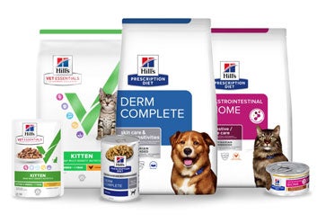 Eine Zusammenstellung von Hill's-Produkten, einschließlich Trockenfutter, Nassfutter und Leckerlis.